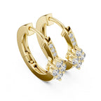 Yellow gold hoop earrings with real diamond accents on a white background