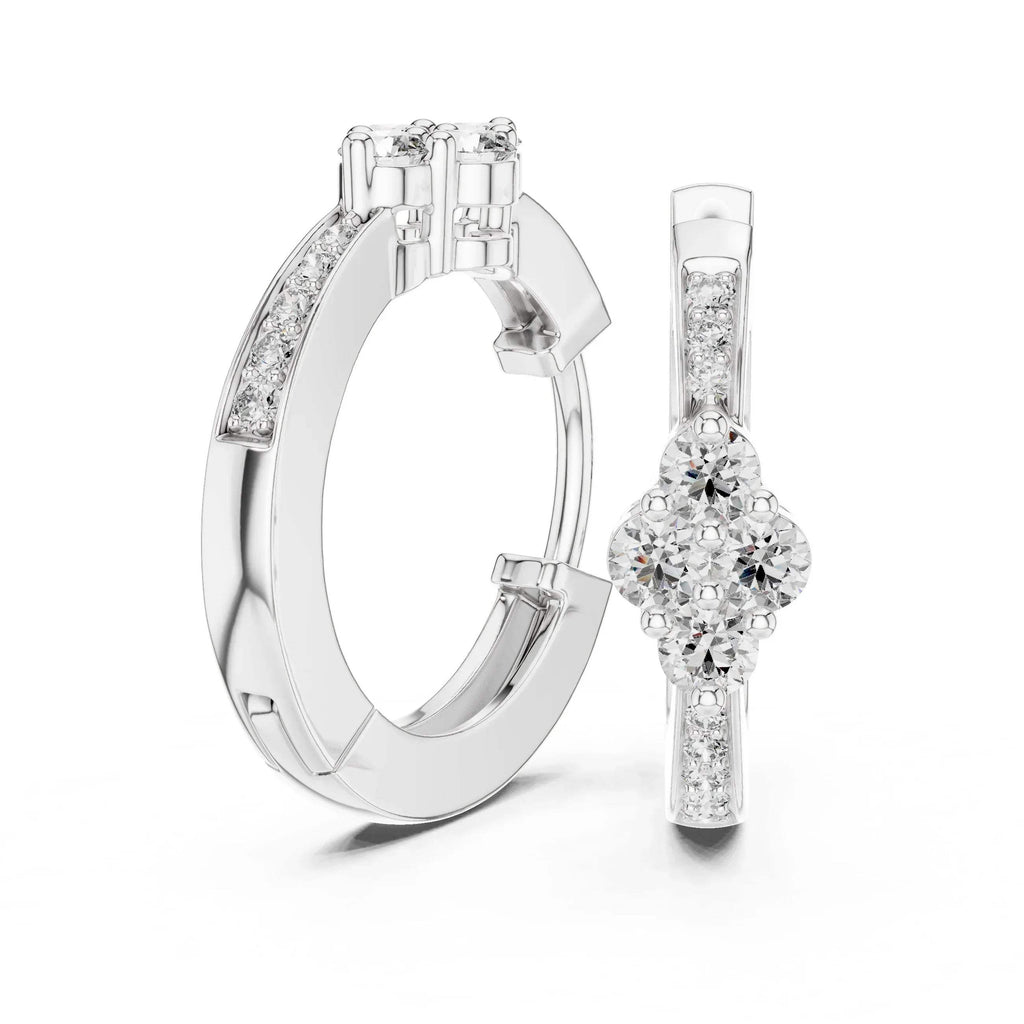 White gold & real diamond earrings on a white background