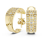 Yellow gold hoop earrings with real diamond accents on a white background
