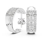 White gold hoop earrings with real diamond accents on a white background