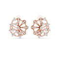 Rose gold earrings with real diamond accents on a white background