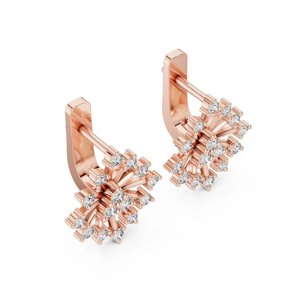 Rose gold earrings with diamond accents on a white background