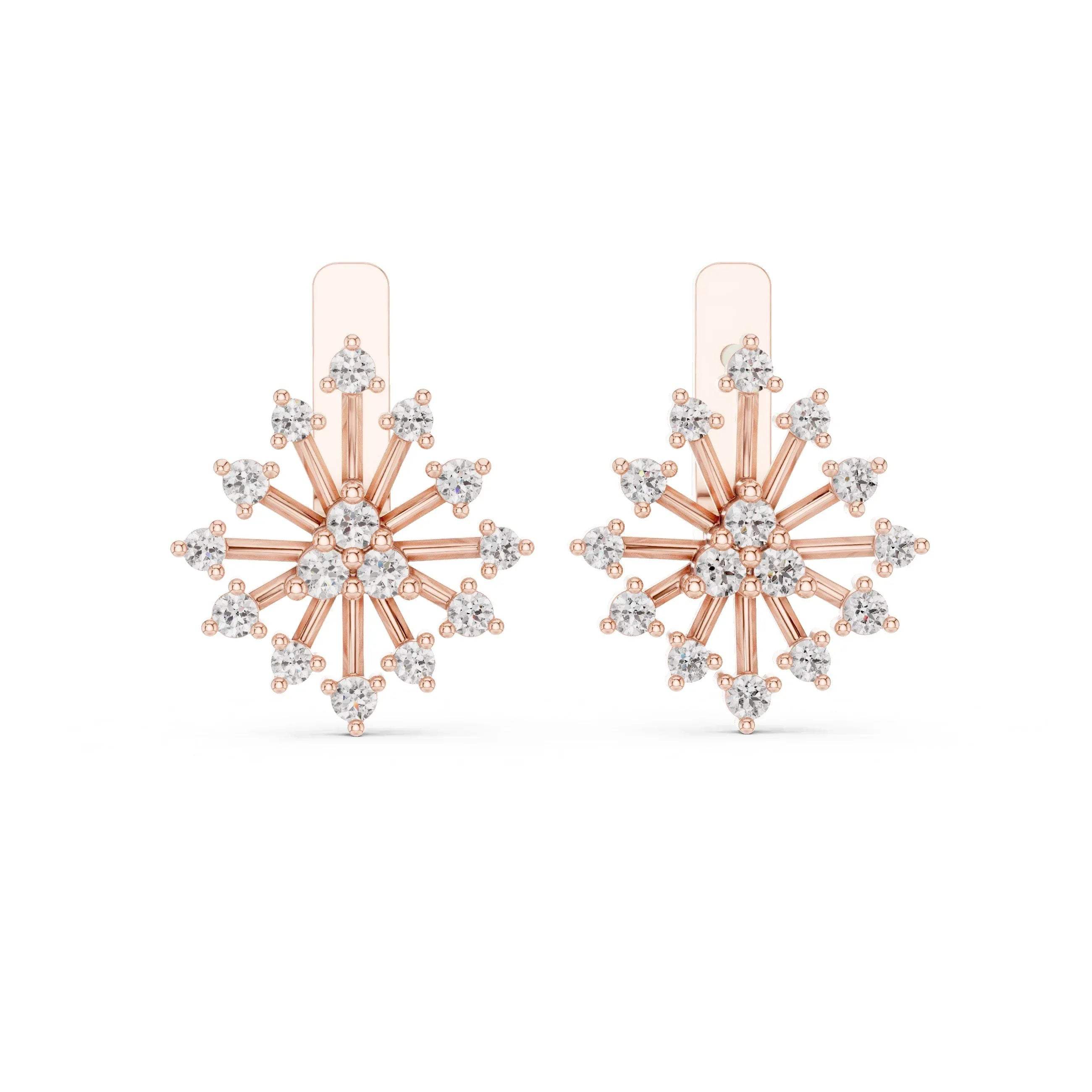 Rose gold and diamond snowflake earrings on a white background