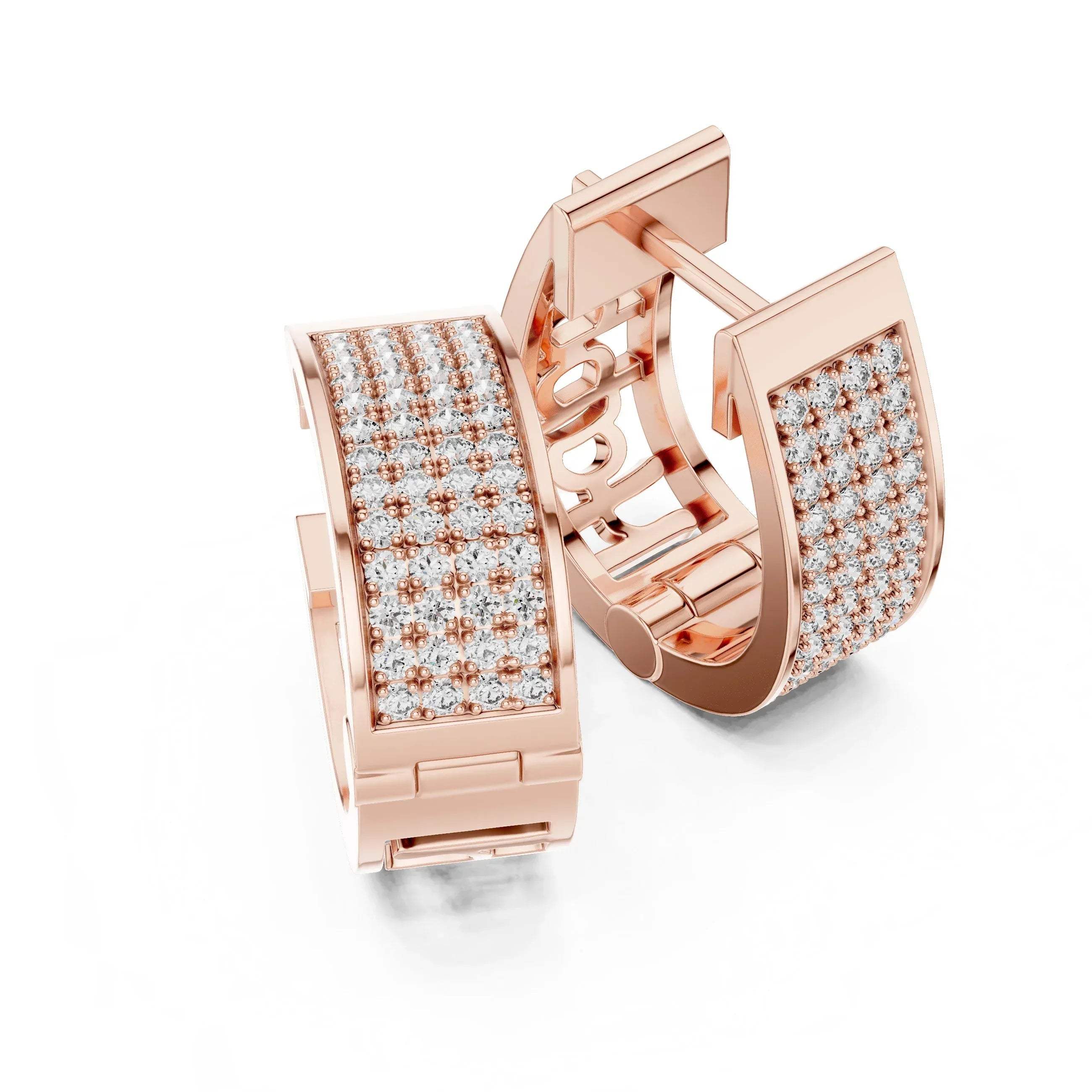 Rose gold hoop earrings with real diamond accents on a white background