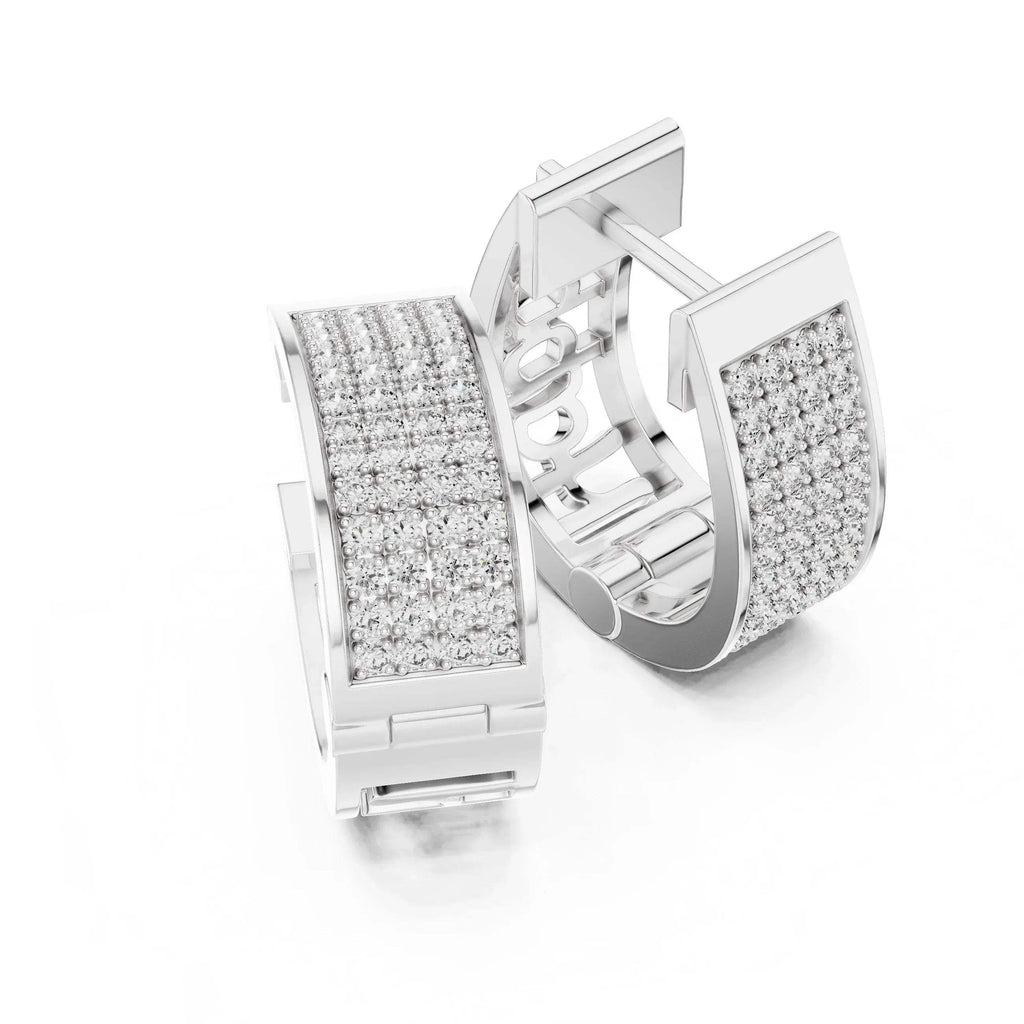 Pair of white gold hoop earrings with clear real diamonds on a white background