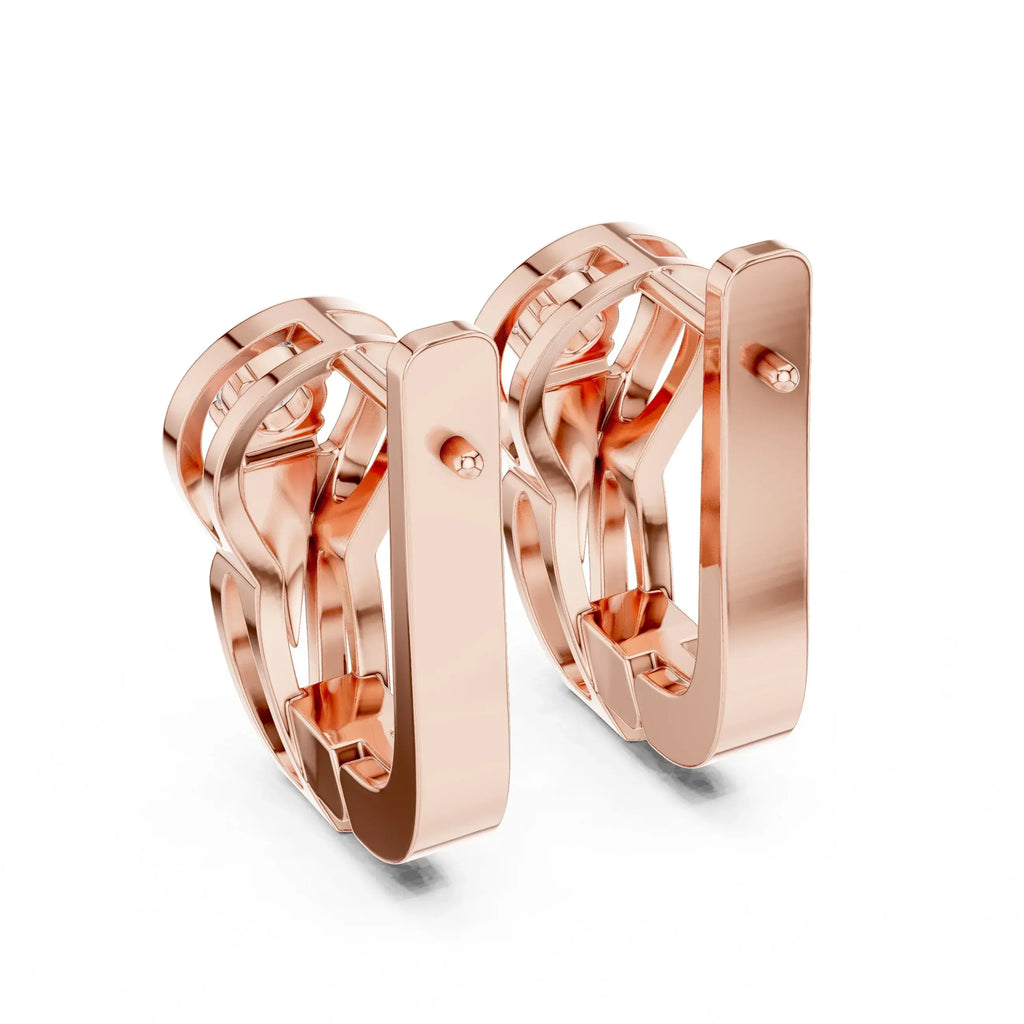 Rose gold hoop earrings with real diamonds on a white background
