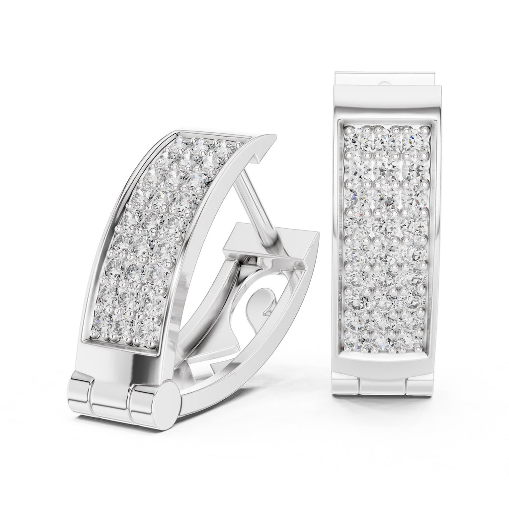 White gold earrings with diamonds inlay and packaging on a white background