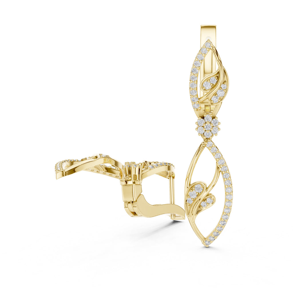Yellow gold earrings with diamond accents on a white background