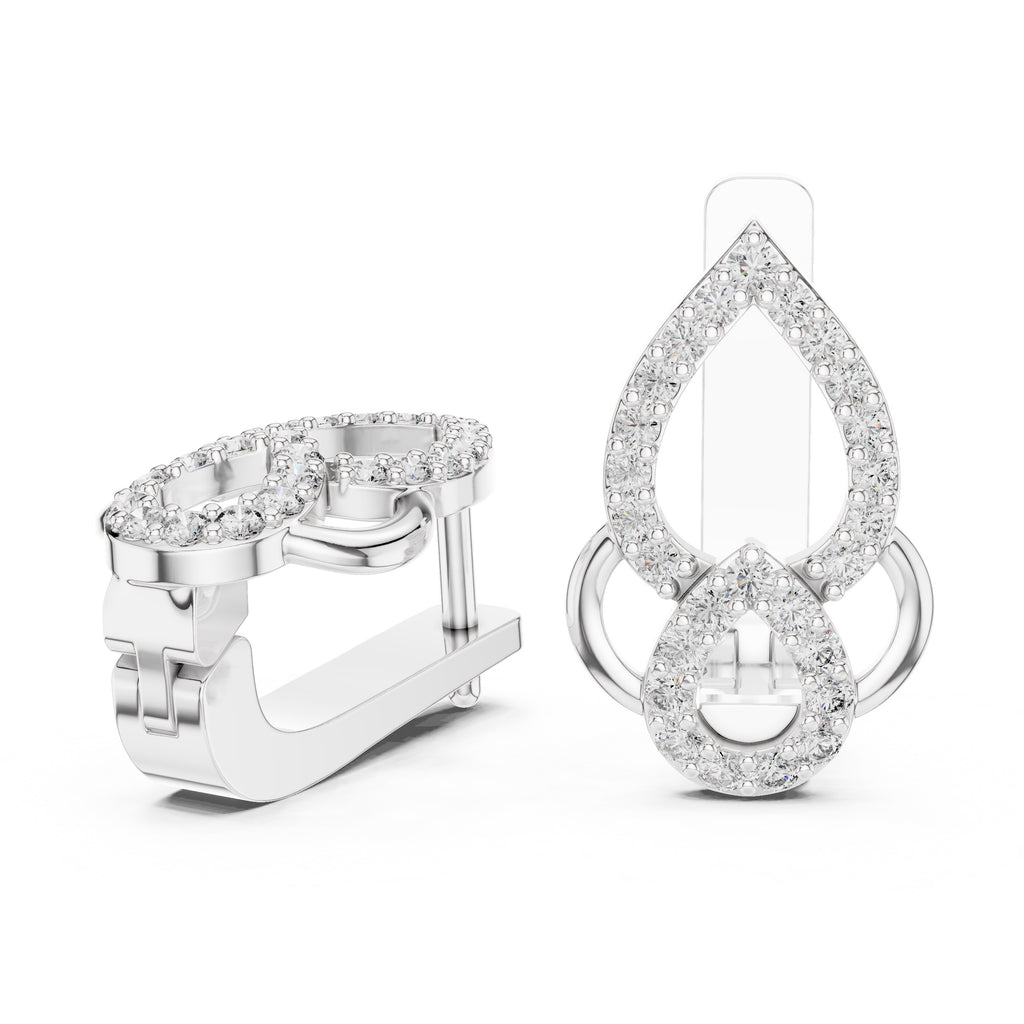 Pair of White gold hoop earrings with clear diamonds on a white background
