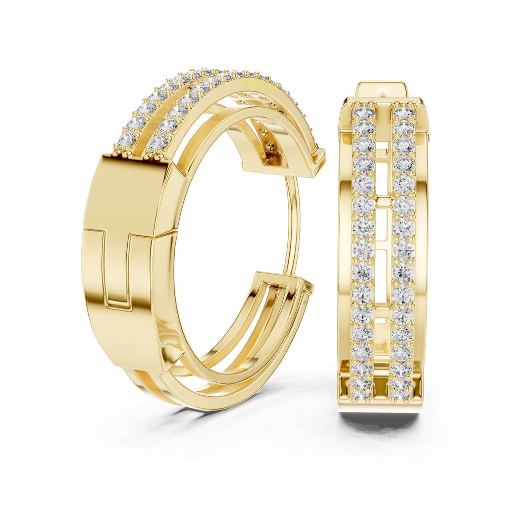 Yellow gold hoop earrings with diamond accents on a white background