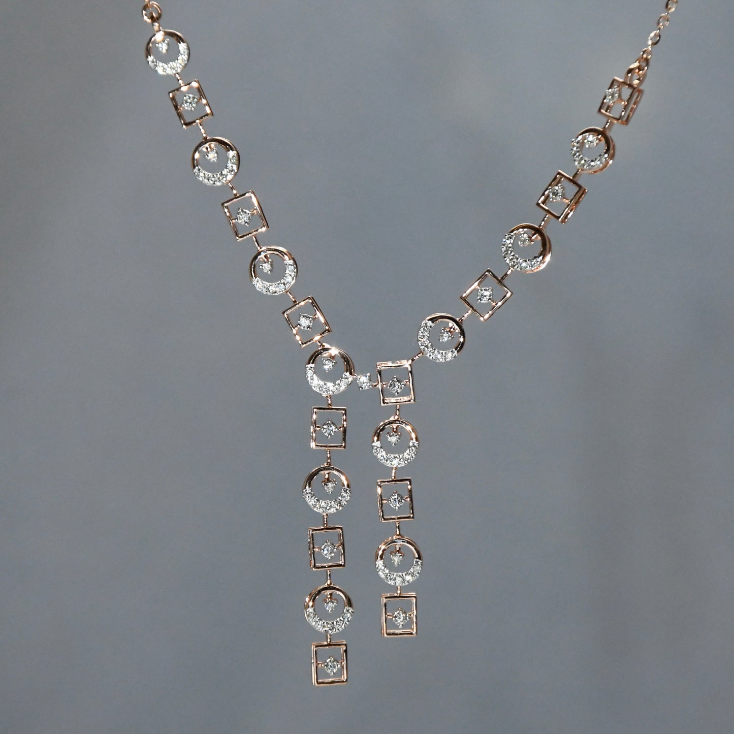 Diamond necklace on a gray background