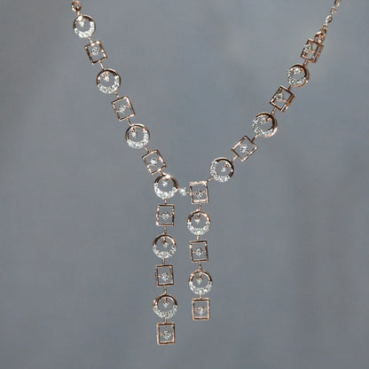 Diamond necklace on a gray background