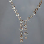 Diamanté necklace on a gray background