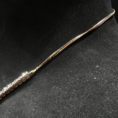 Designer diamond necklace set from side angle is displayed on a mannequin bust.