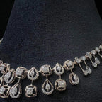 Diamanté necklace on a black stand