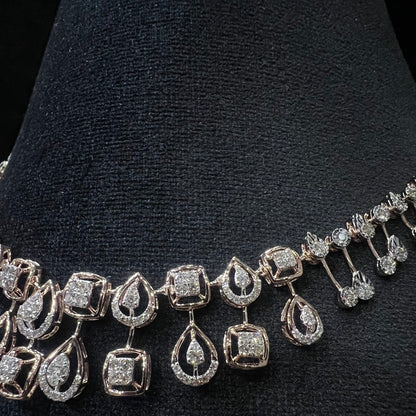 Diamanté necklace on a black stand