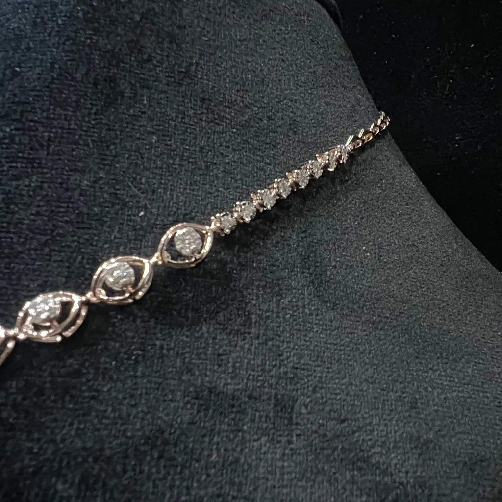 Radiant cascade diamond necklace set from side angle displayed on black velvet bust
