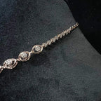 Radiant cascade diamond necklace set from side angle displayed on black velvet bust