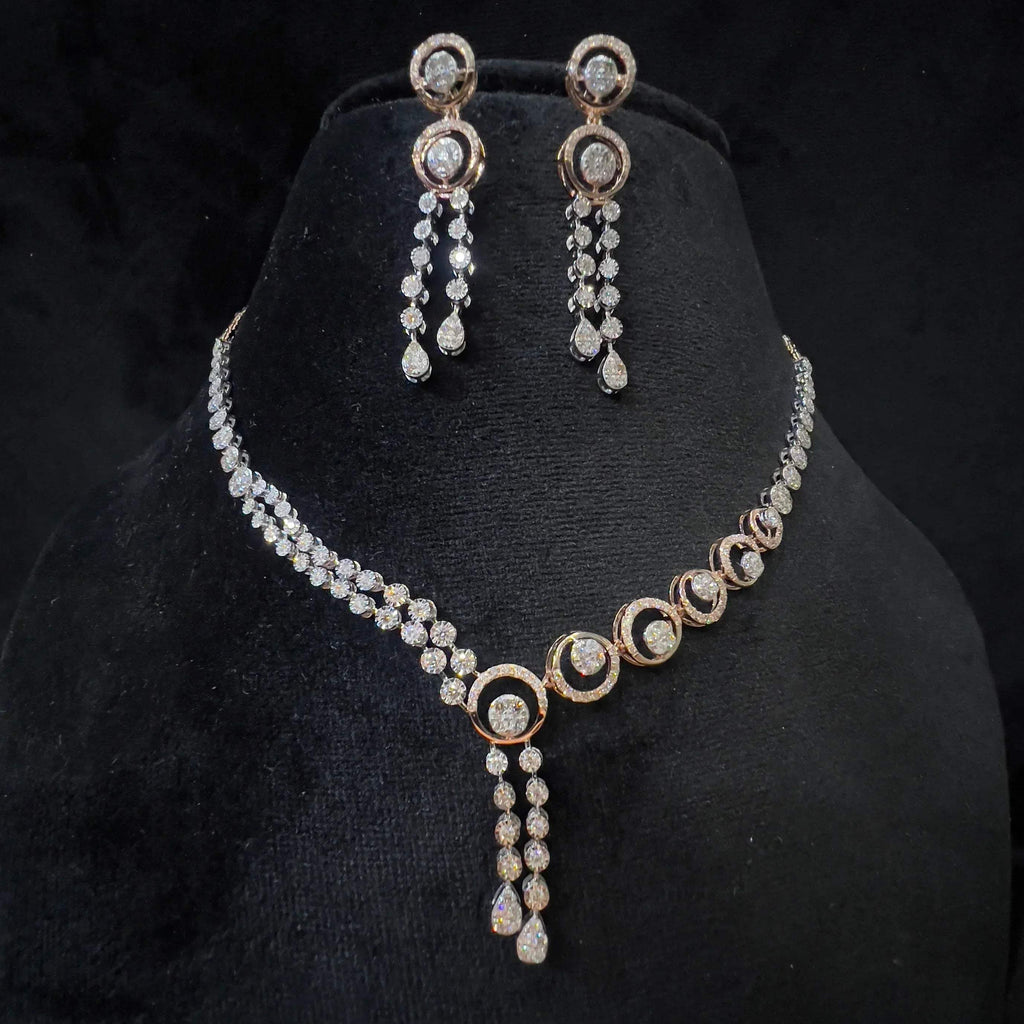 Diamond necklace set with circular motif design and matching drop earrings, featuring sparkling stones in elegant modern style.