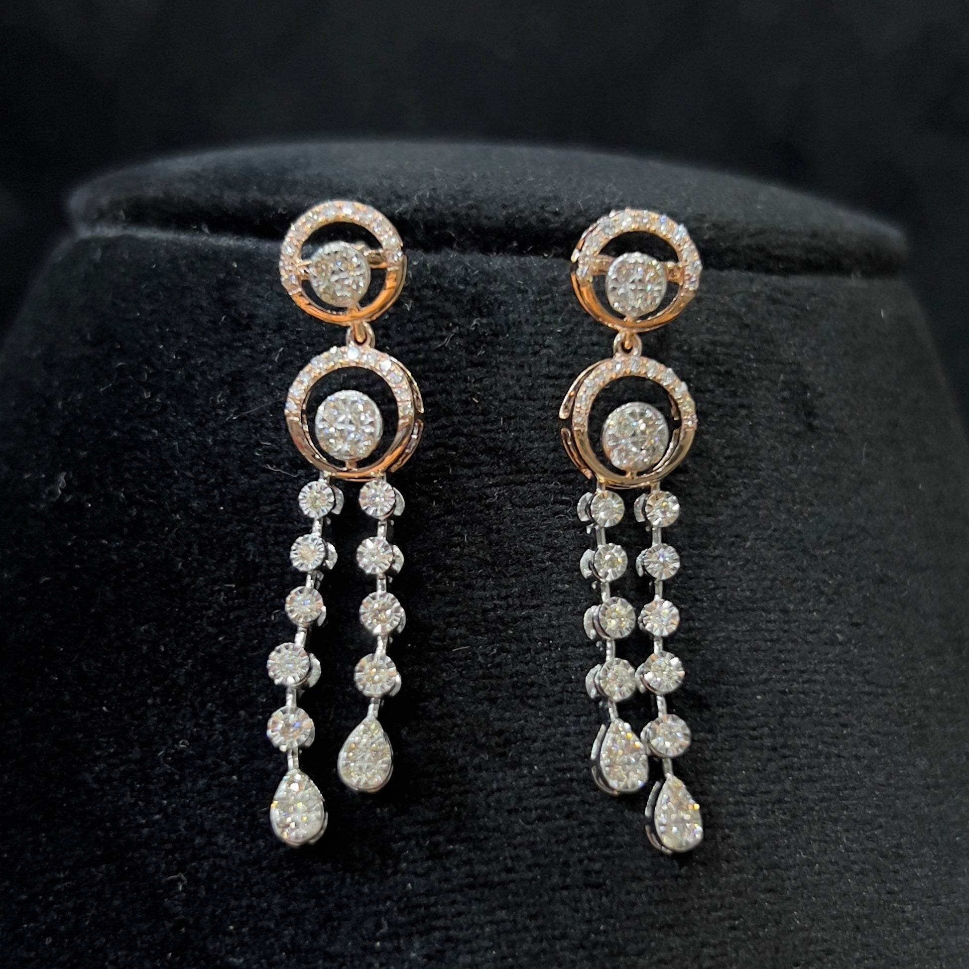 Diamond necklace set with circular motif design and matching drop earrings, featuring sparkling stones in elegant modern style.