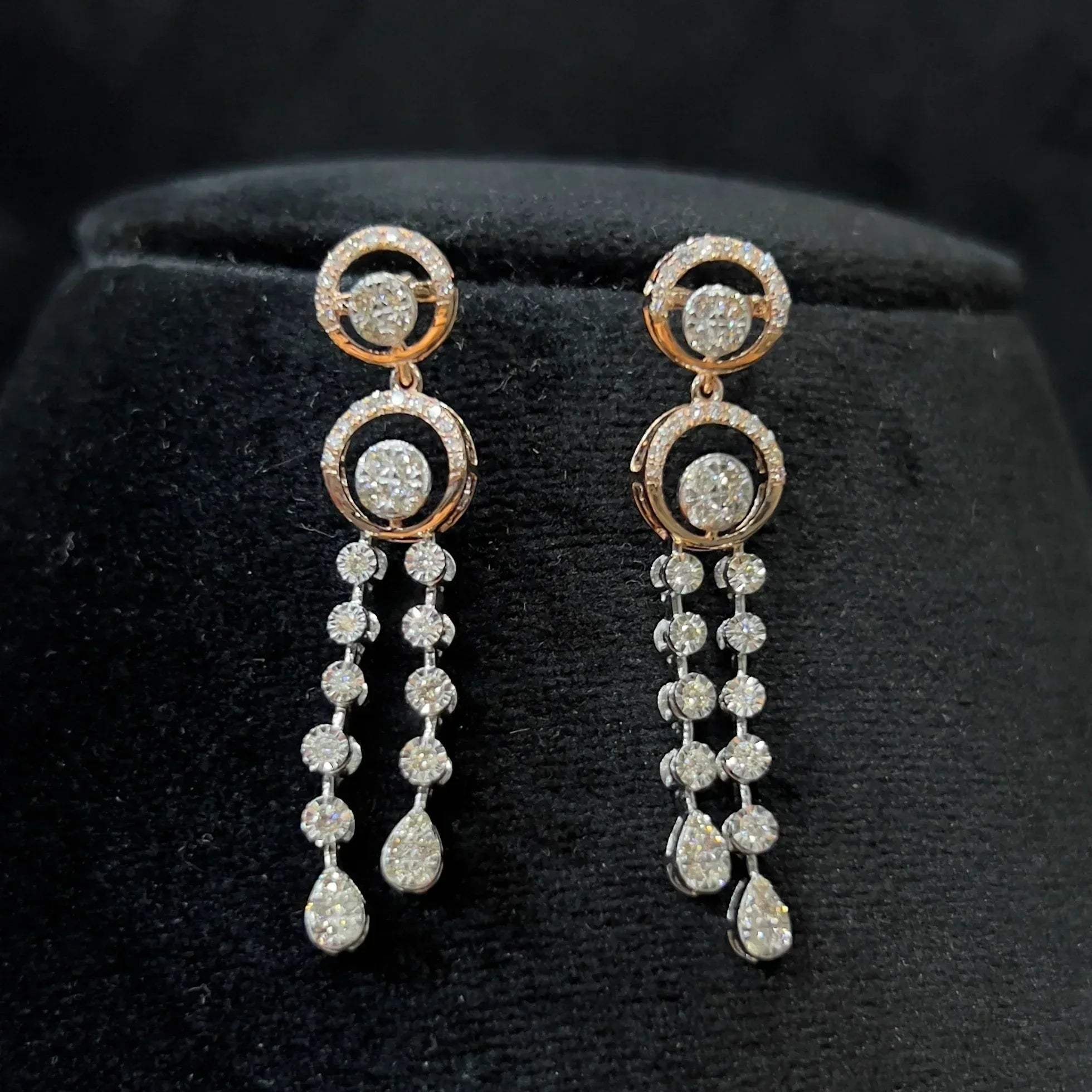 Diamond necklace set with circular motif design and matching drop earrings, featuring sparkling stones in elegant modern style.