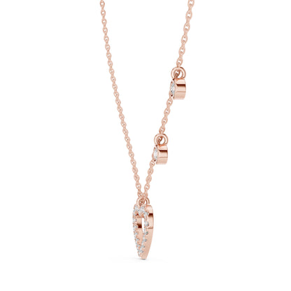 Rose gold necklace with a heart-shaped pendant on a white background