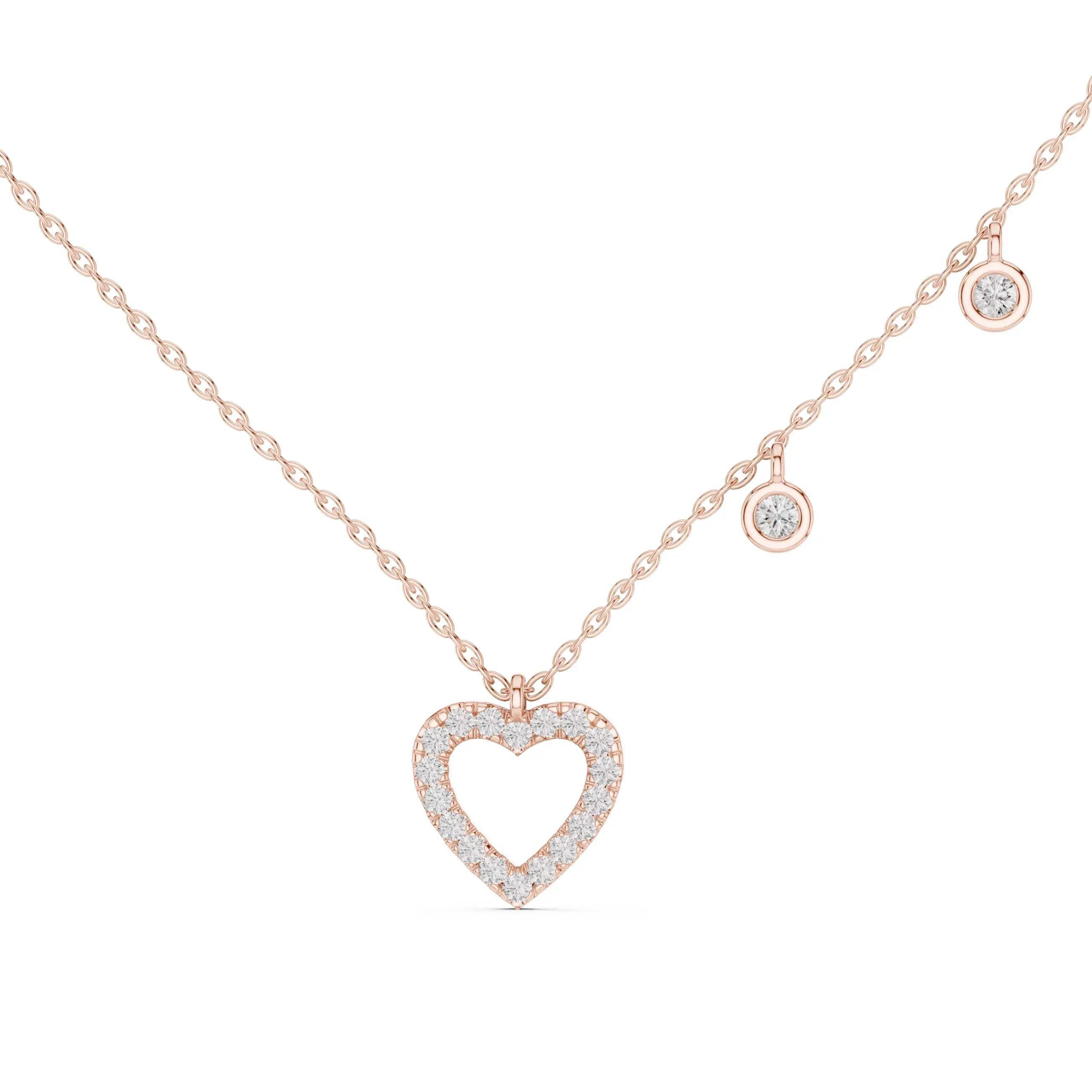 Rose gold heart-shaped necklace with diamonds on a white background