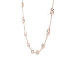 Rose gold necklace with diamonds on a white background