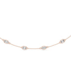 Rose gold necklace with diamond accents on a white background