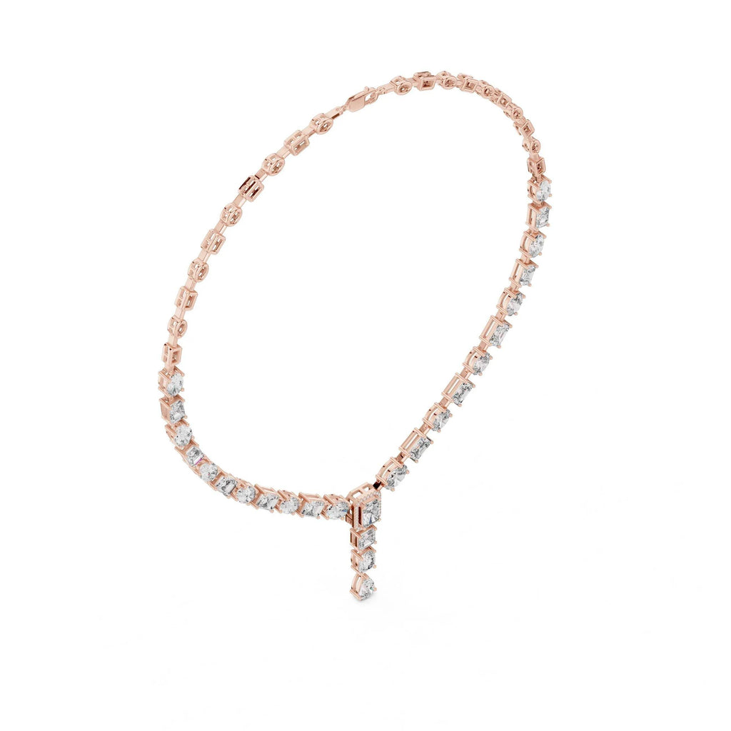 Rose gold necklace with clear real diamonds on a white background