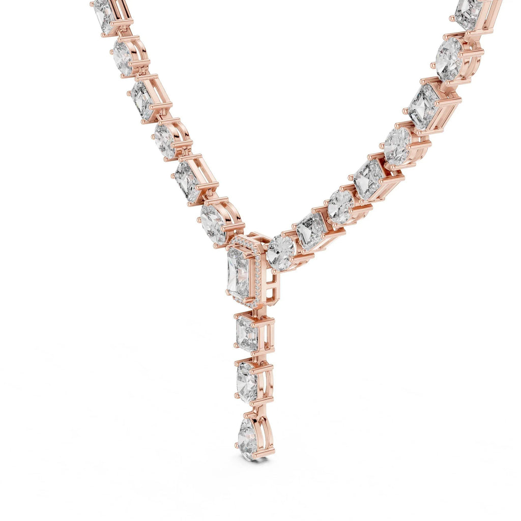 Rose gold necklace with diamonds on a white background