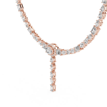 Rose gold necklace with diamonds on a white background