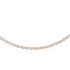 Rose gold necklace with real diamonds on a white background