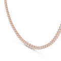 Rose gold tennis necklace with real diamonds in bezel setting on a white background