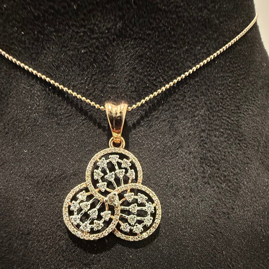 A gold diamond pendant with a floral design, displayed on a black mannequin necklace stand.