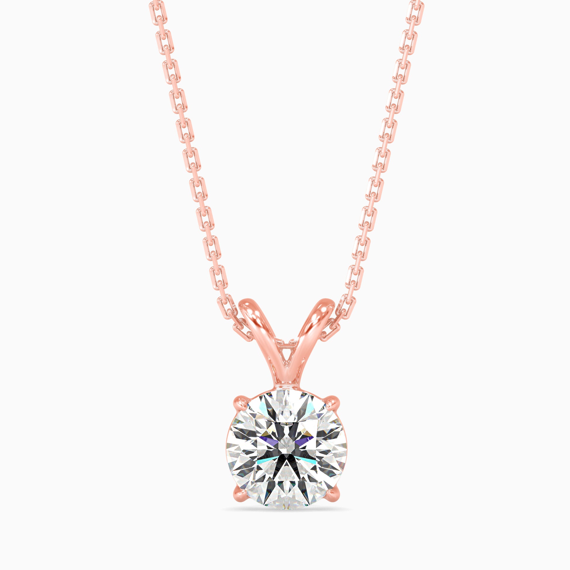Rose gold pendant with a round brilliant-cut solitaire diamond on a delicate chain in rose gold.