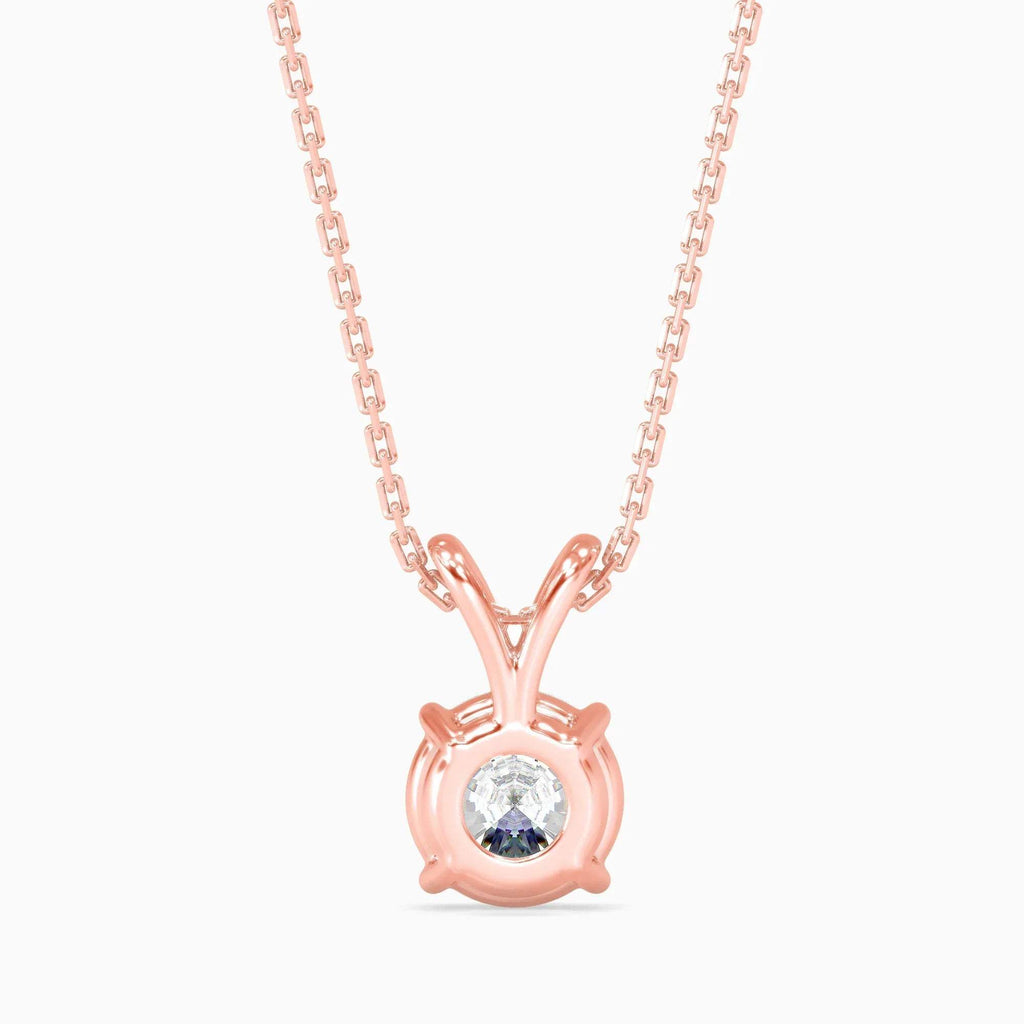 Rose gold necklace with a round diamond pendant on a white background