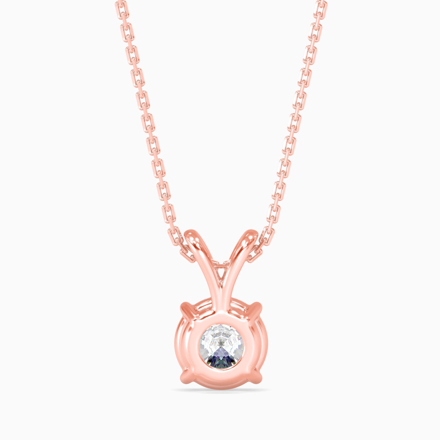 Rose gold necklace with a round pendant on a white background