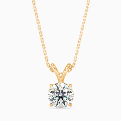 Yellow gold necklace with a round solitaire diamond pendant on a white background