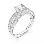 White gold ring with a large central diamond and smaller diamonds on the band against a white background