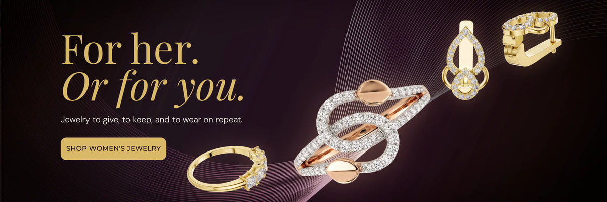 Promotional jewelry banner on a dark purple background with gold typography reading 'For her. Or for you.