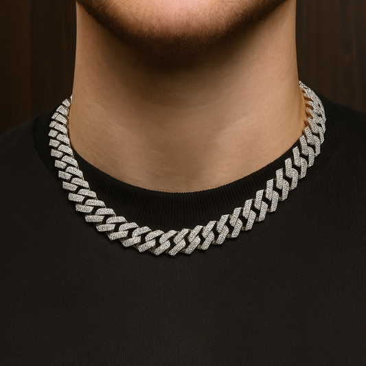 Luxury gold Cuban chain necklace with pavé-set diamonds and bold interlocking links for a stylish statement look.