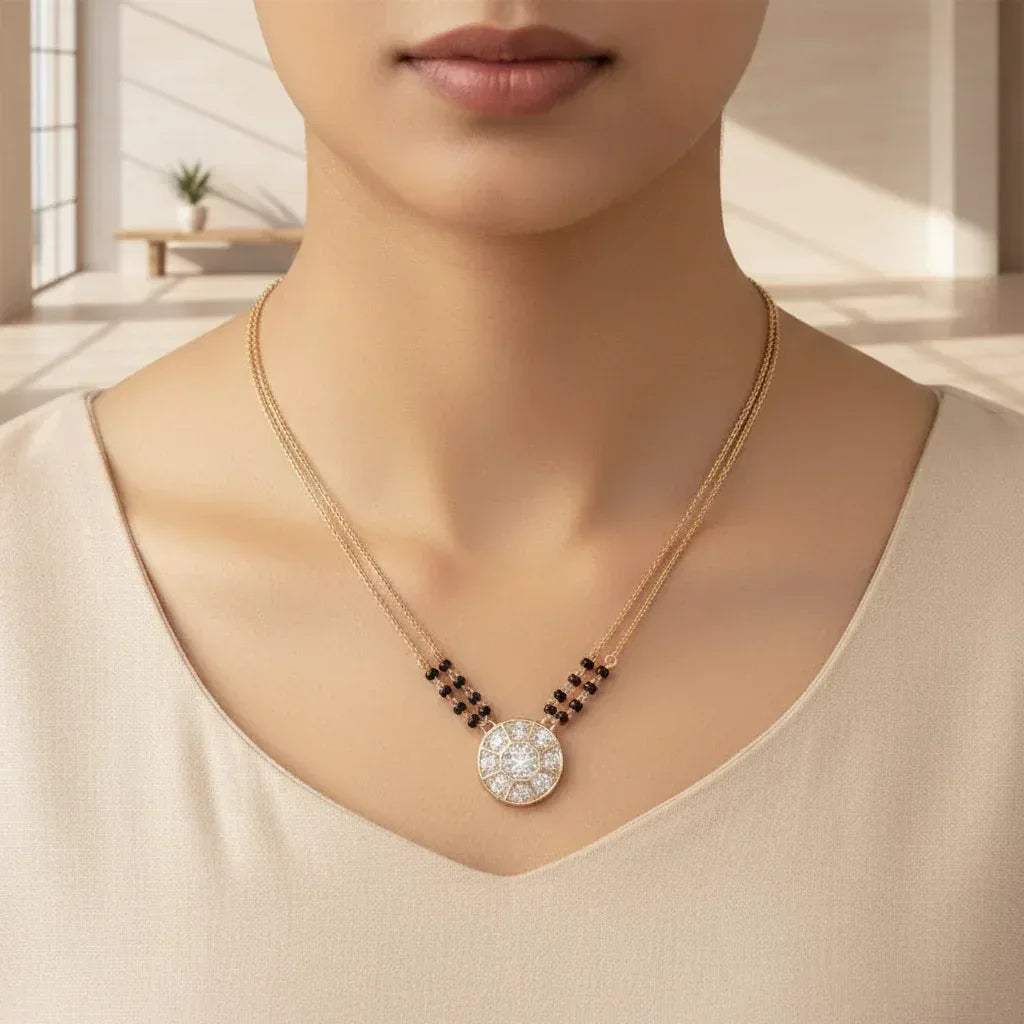 Elegant gold diamond mangalsutra with a circular diamond-studded pendant in honeycomb design, paired with black bead and gold chain for a modern traditional look.