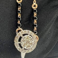 Elegant gold diamond mangalsutra with round halo diamond pendant and dual black bead gold chain, perfect for daily wear and modern bridal style.