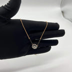 Elegant gold diamond mangalsutra with round halo diamond pendant and dual black bead gold chain, perfect for daily wear and modern bridal style.