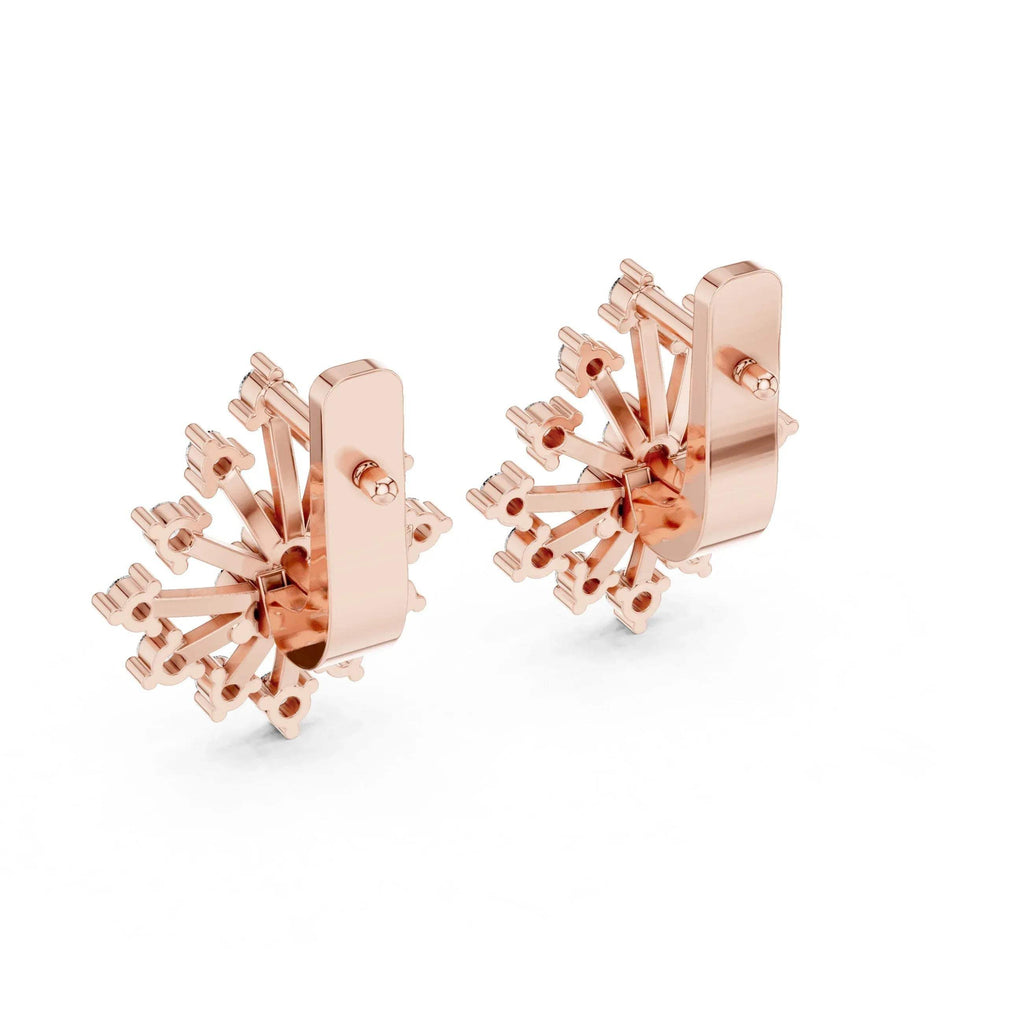 Rose gold and lab grown diamond earrings on a white background