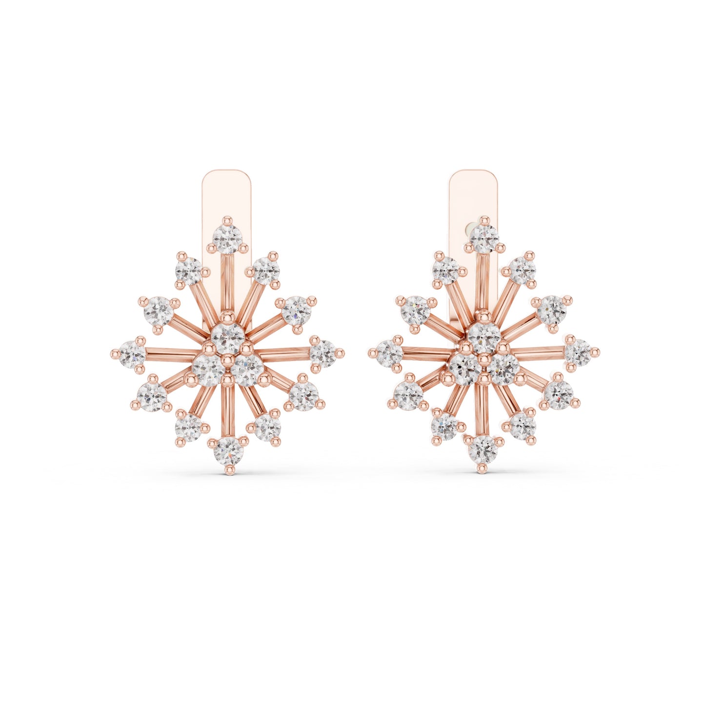Rose gold and lab grown diamond snowflake earrings on a white background