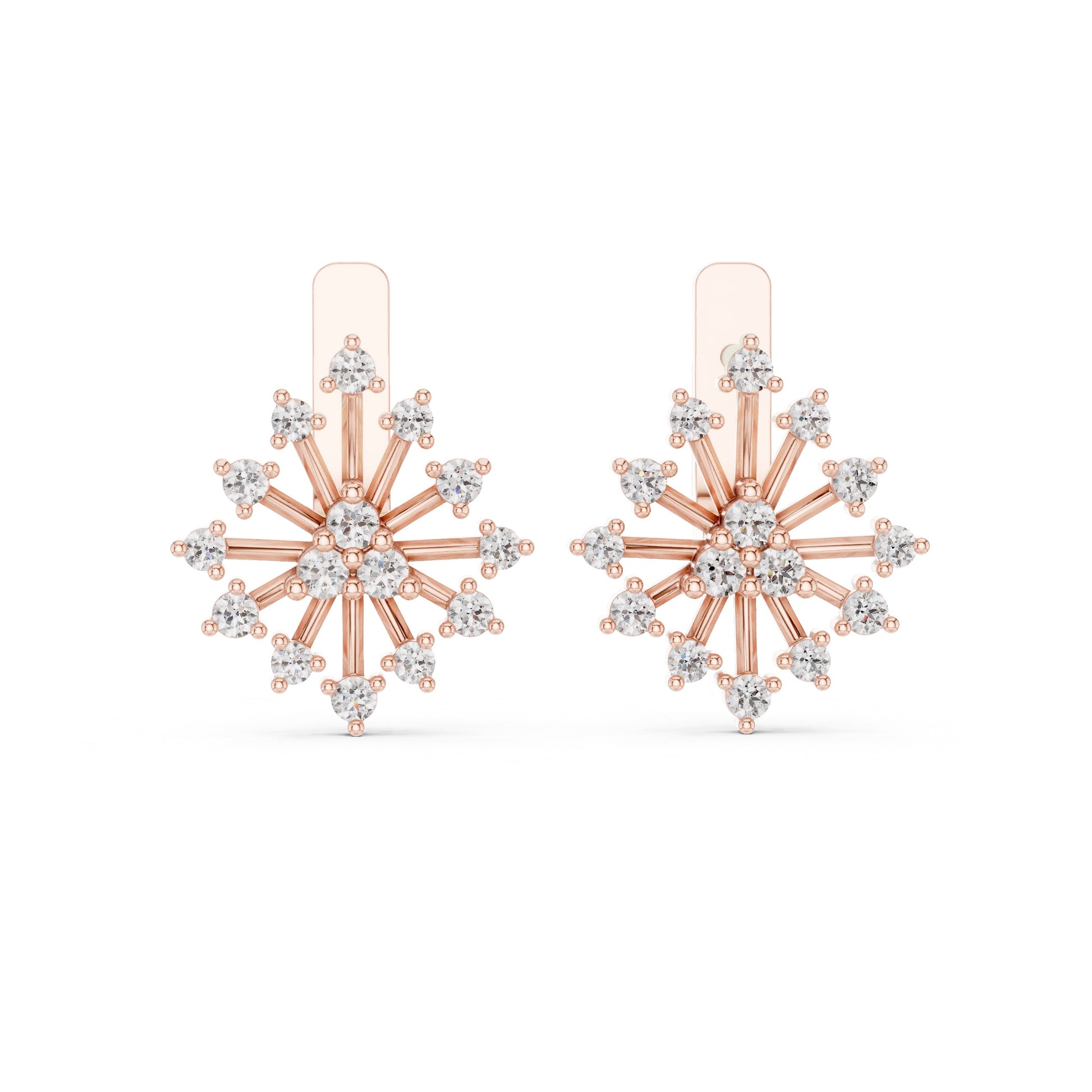 Rose gold and lab grown diamond snowflake earrings on a white background