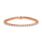 gold bracelet with lab grown diamonds on a white background
