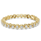 Gold bracelet with lab grown diamond accents on a white background